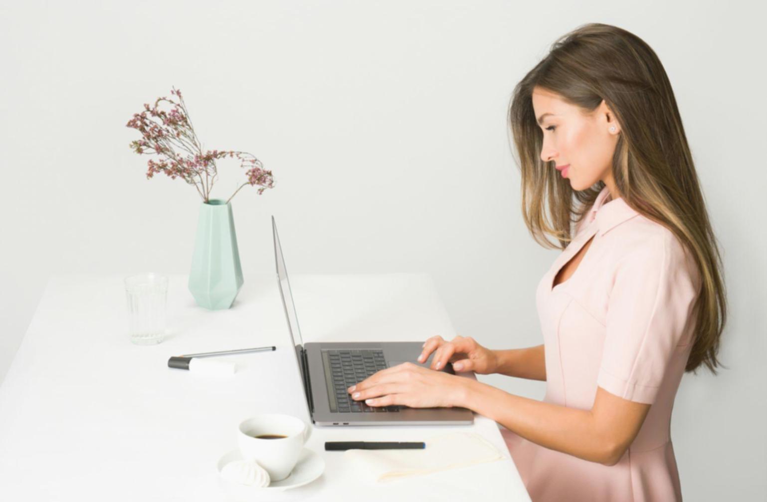 Person reviewing financial statements with calculator and highlighting important budget categories
